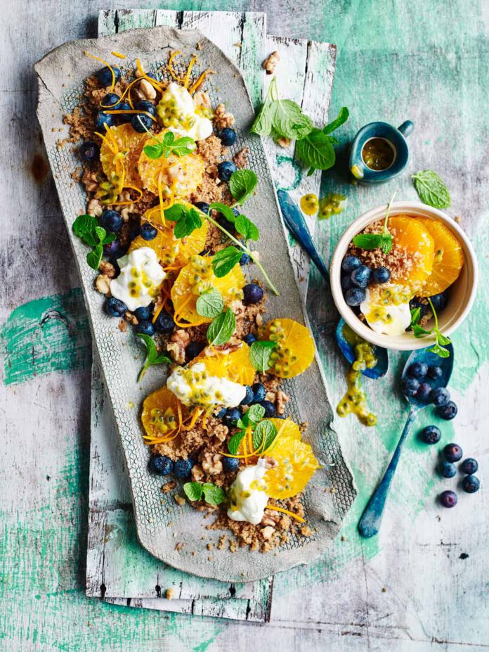 Spicy semolina with oranges blueberries yoghurt passion fruit