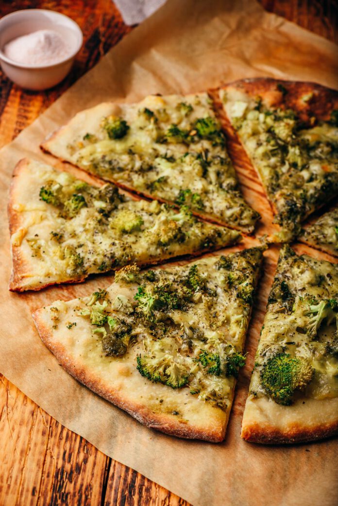 Homemade Pizza with Broccoli, Pesto Sauce & Cheese