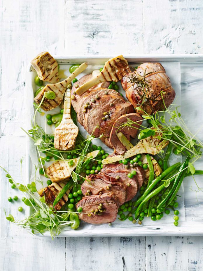Roast lamb with artichokes, peas, fava beans and green beans