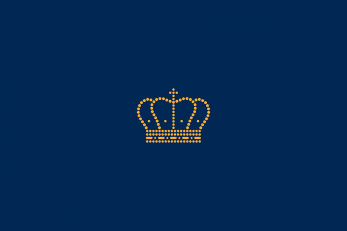 Gold crown on blue background