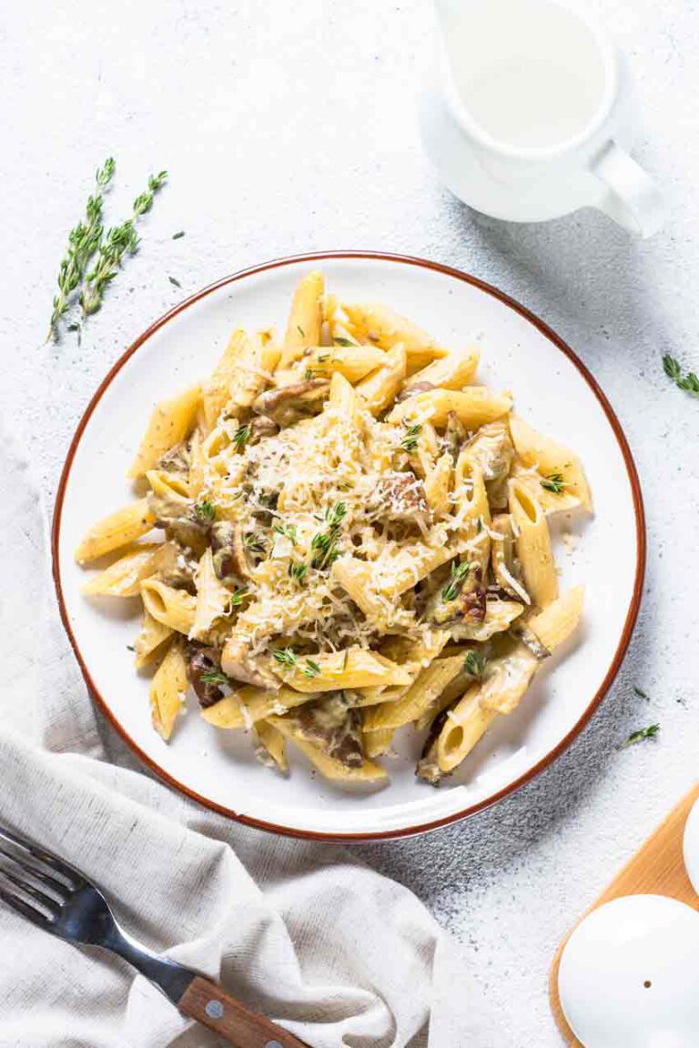 Pasta with truffle cheese, mushrooms and fresh herbs