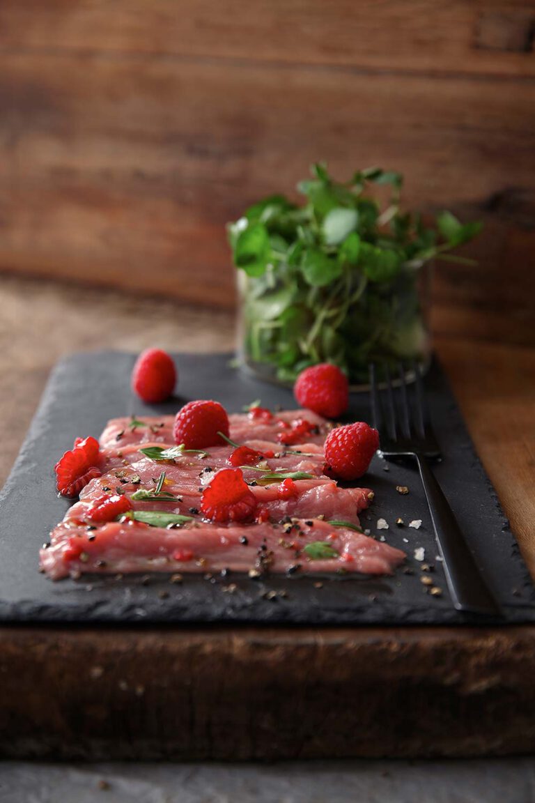 Veal carpaccio with raspberry vinaigrette
