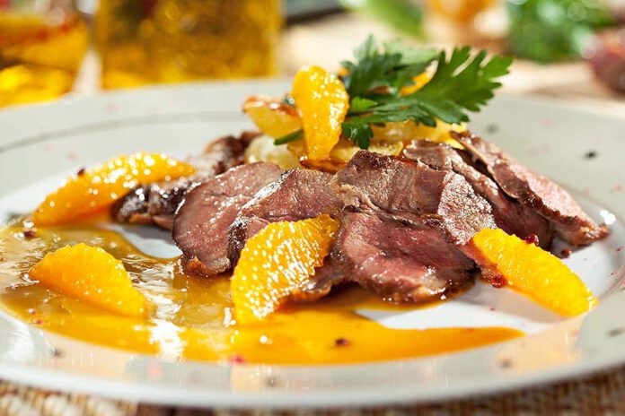 Wild duck breast in orange sauce