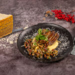 "Wäinzoossiss" sausage with Luxembourgish white wine, creamy polenta with Grana Padano, Grandma's garnish