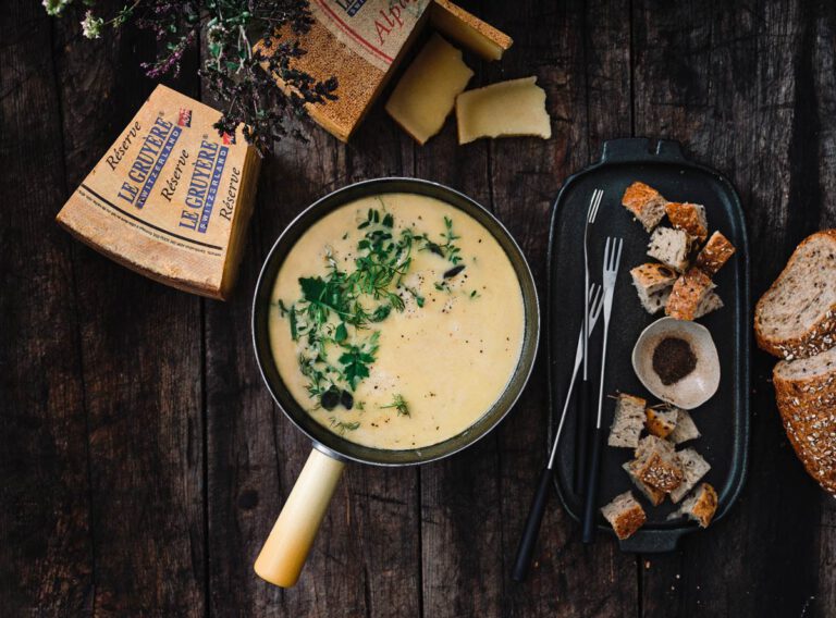 Half and half fondue with flowers and aromatic plants from the mountain