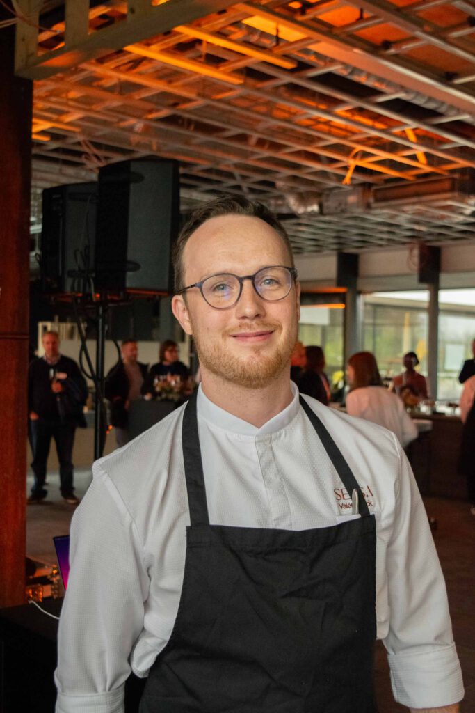 Chef wearing uniform at restaurant event