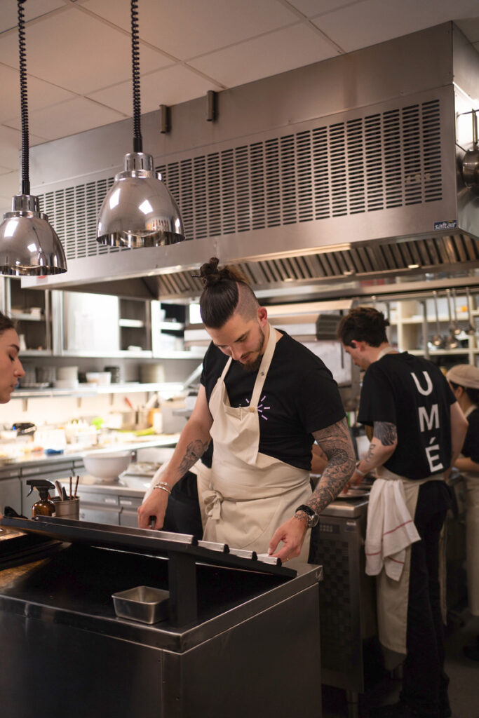 Chef working in a busy kitchen.