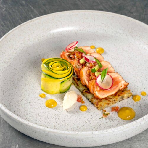 Gourmet dish with seafood and zucchini rose