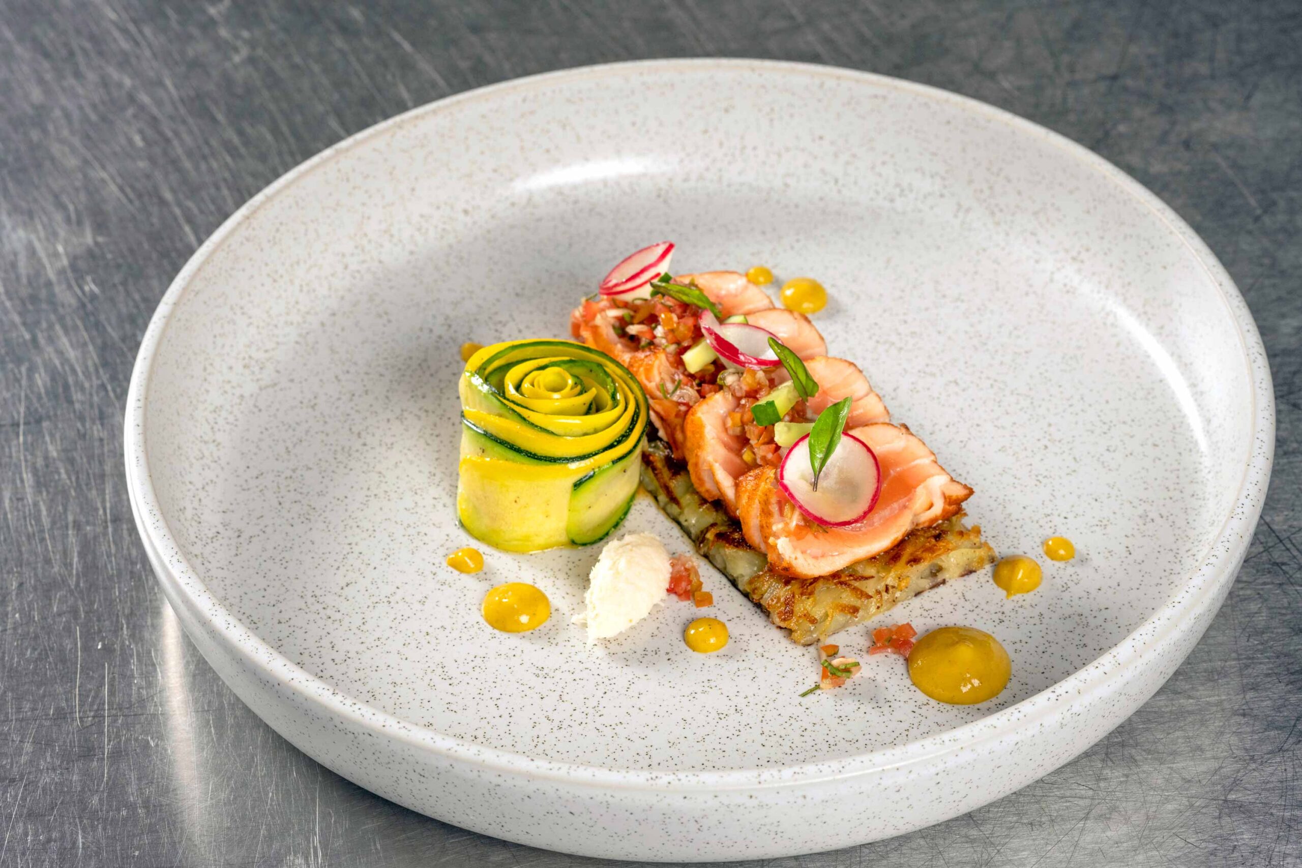 Gourmet dish with seafood and zucchini rose