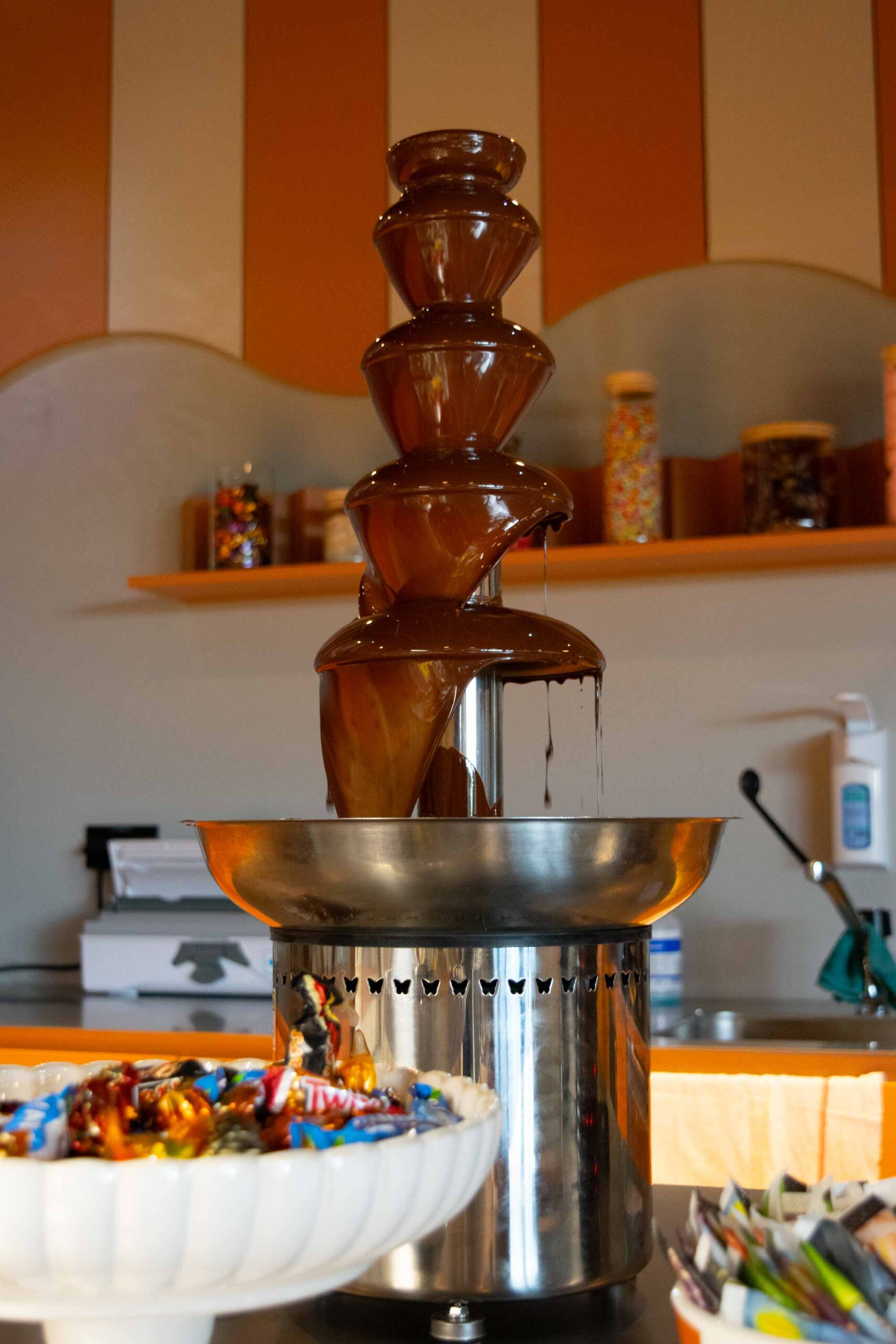 Chocolate fountain in kitchen display.