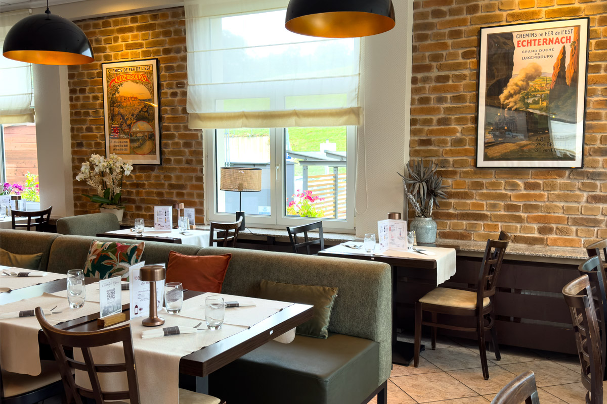 Cozy restaurant with brick walls and vintage posters