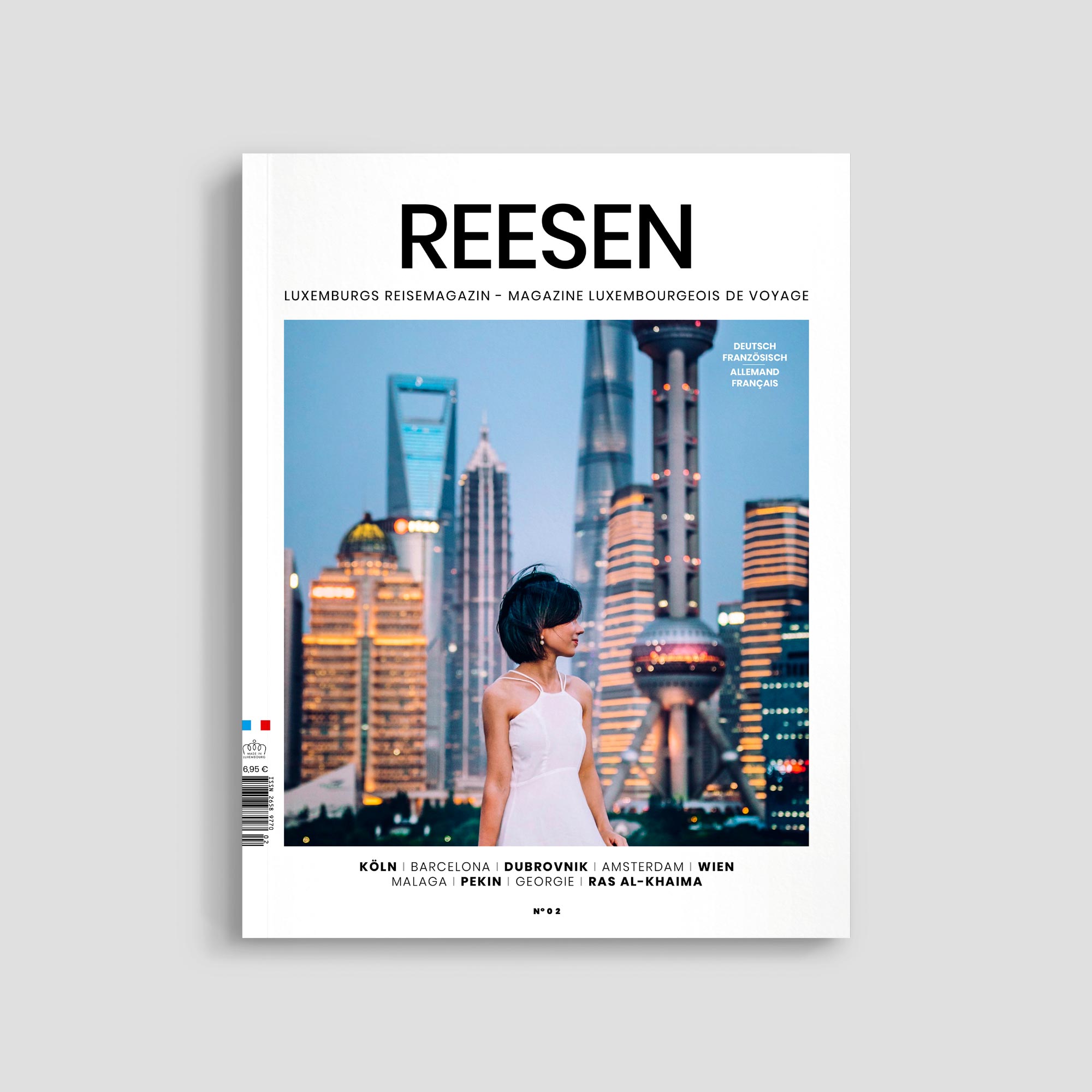 Woman in cityscape on travel magazine cover.