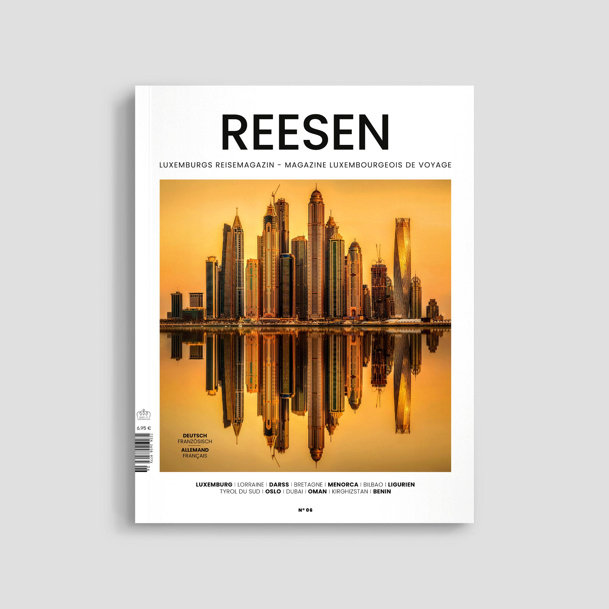 Luxembourg travel magazine cover with city skyline.