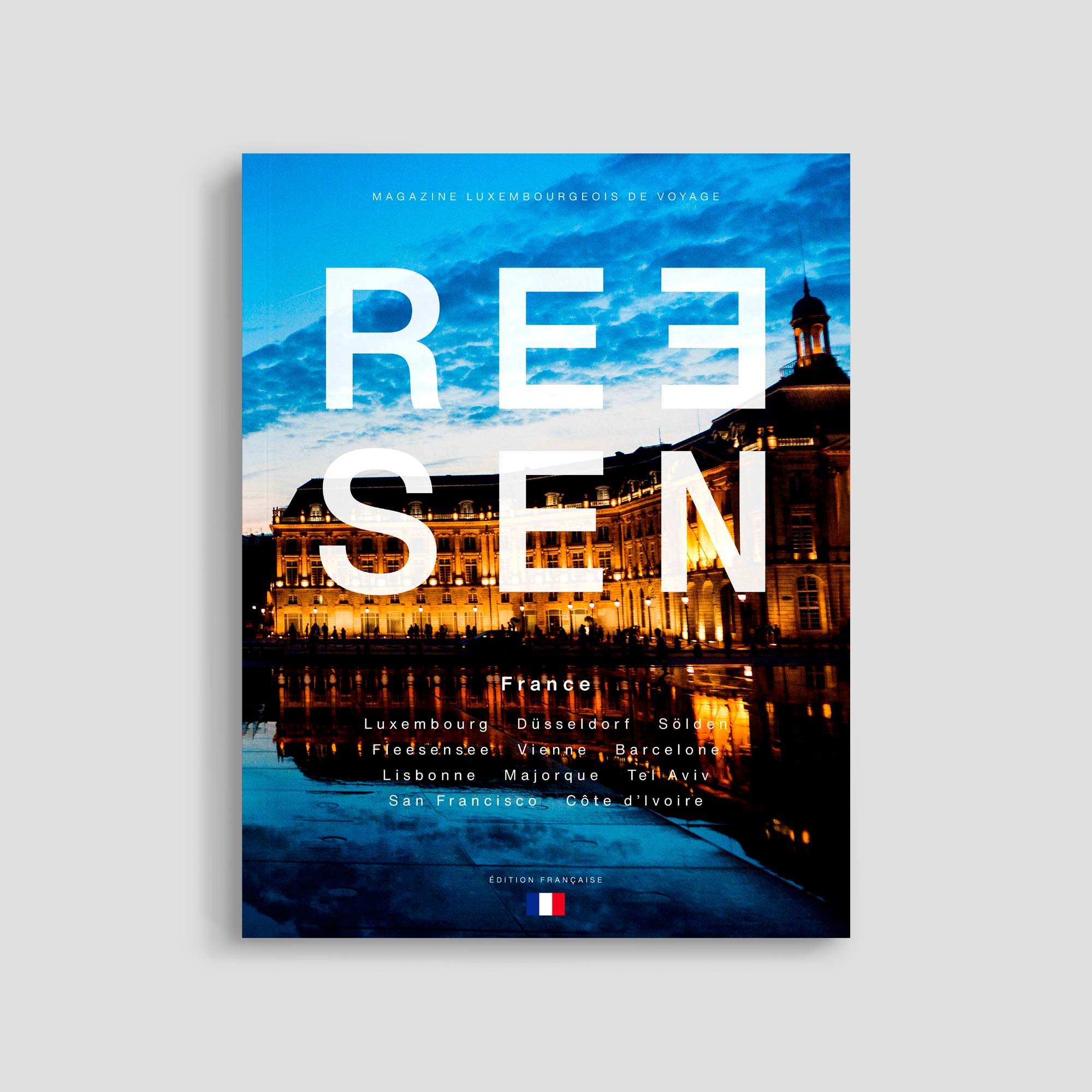 Luxembourg travel magazine cover with nighttime cityscape