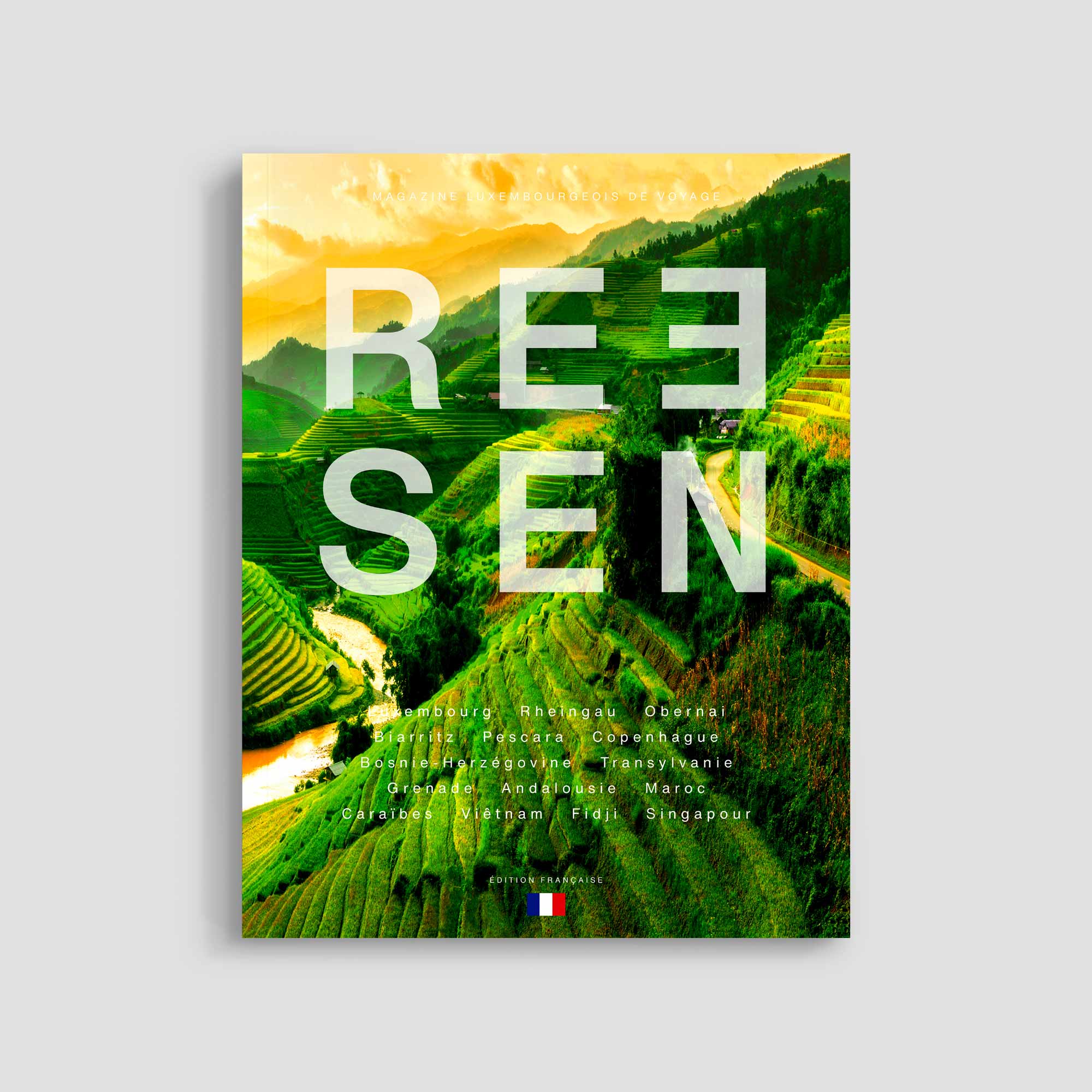 Travel magazine cover with scenic terraced fields.