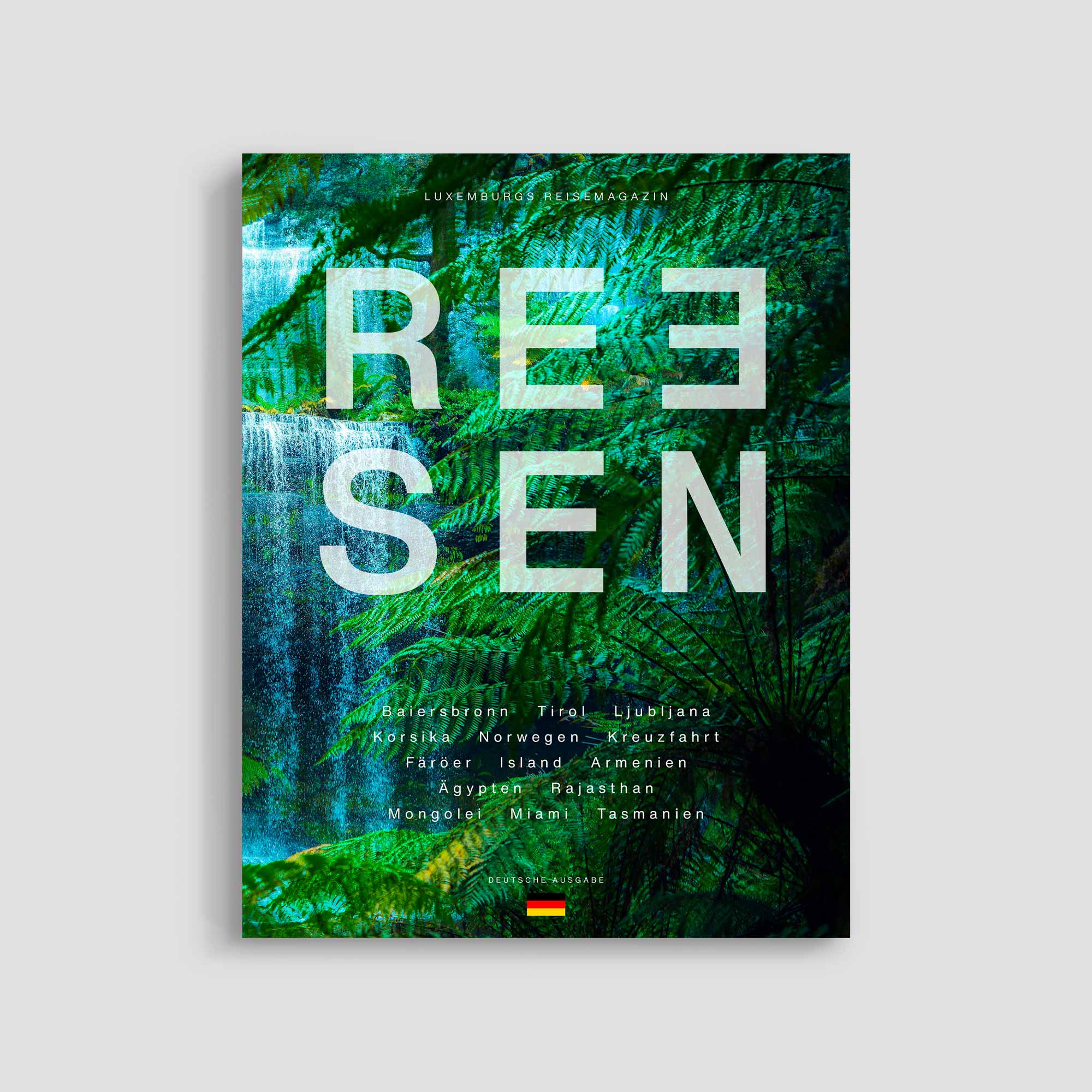 Travel magazine cover with lush green background.